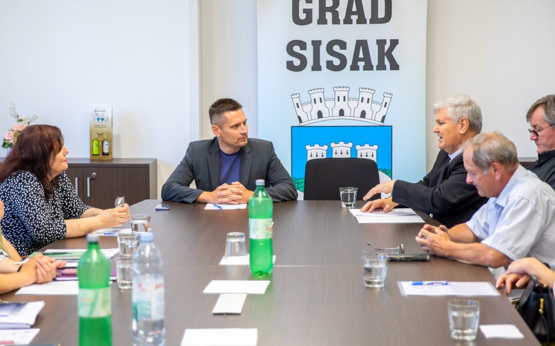 Susret biskupa Košića i gradonačelnika Orlića