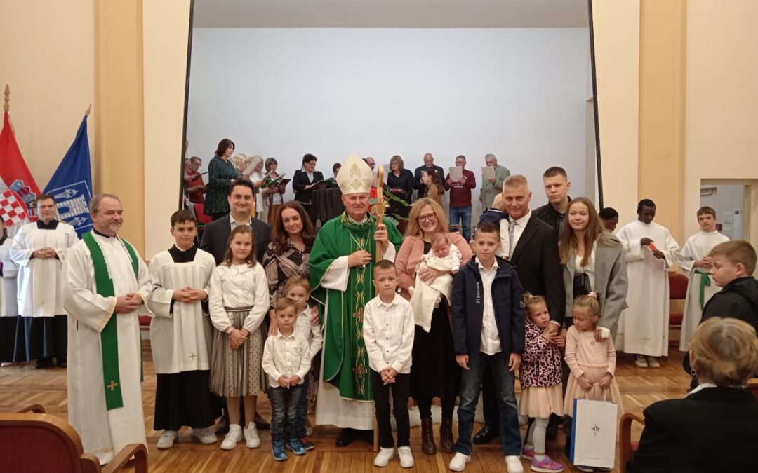 Krštenje osmog djeteta obitelji Nekich